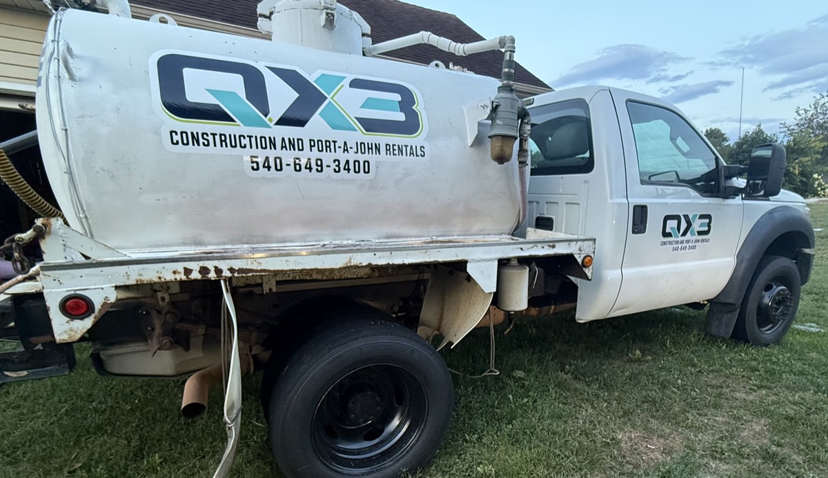 QX3's second vacuum service truck, rear view